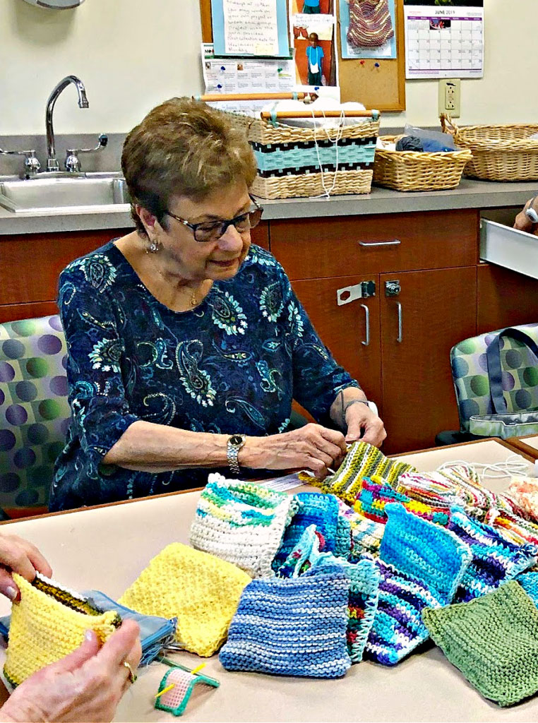 woman making soap sack