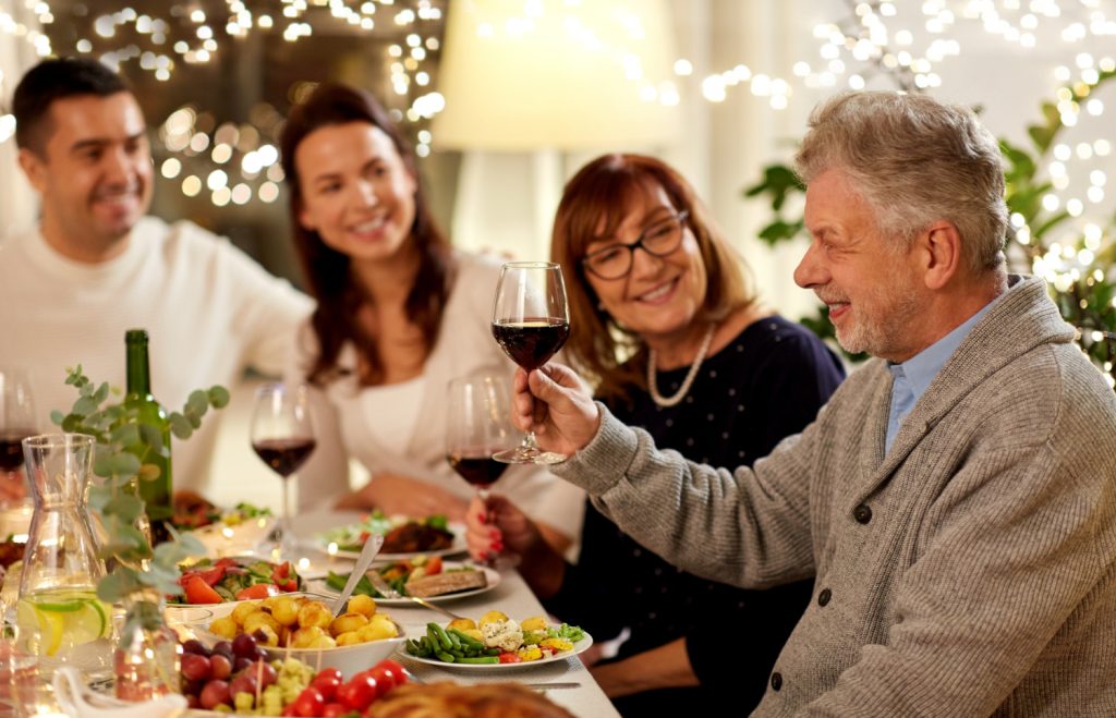 people toasting with wine