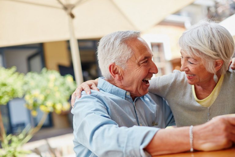 couple hugging and smiling