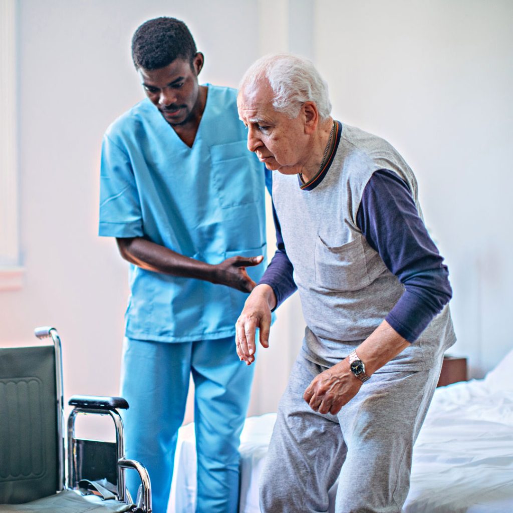 man being helped walking