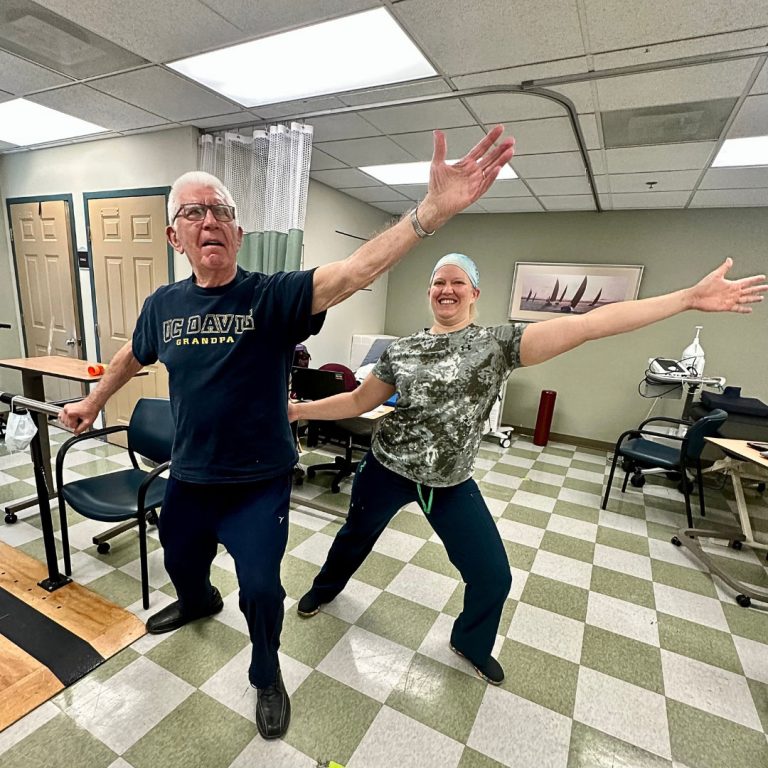 people stretching in rehab