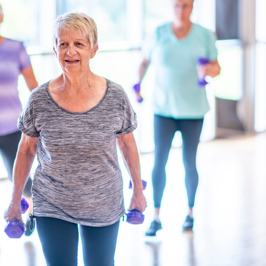 women with hand weights