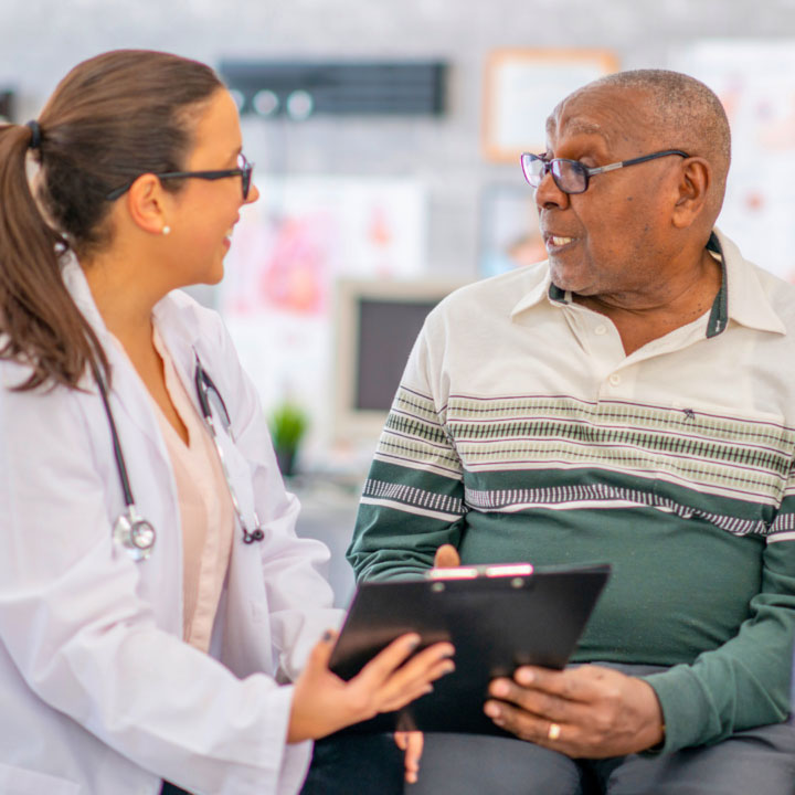 man talking to doctor