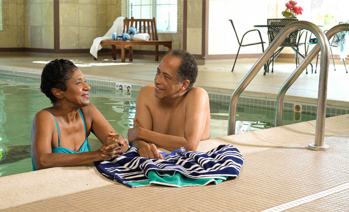 A couple in a swimming pool