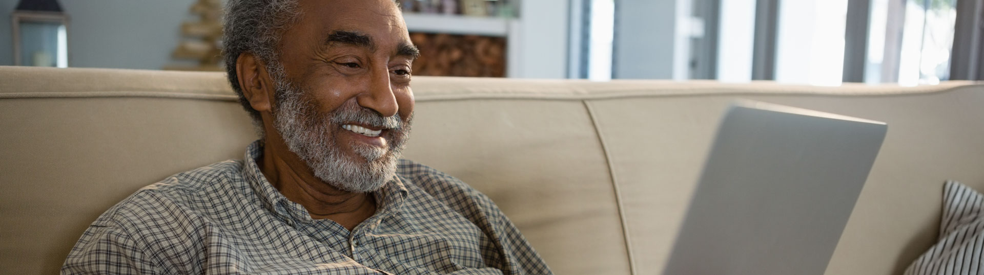 a man looking at his tablet