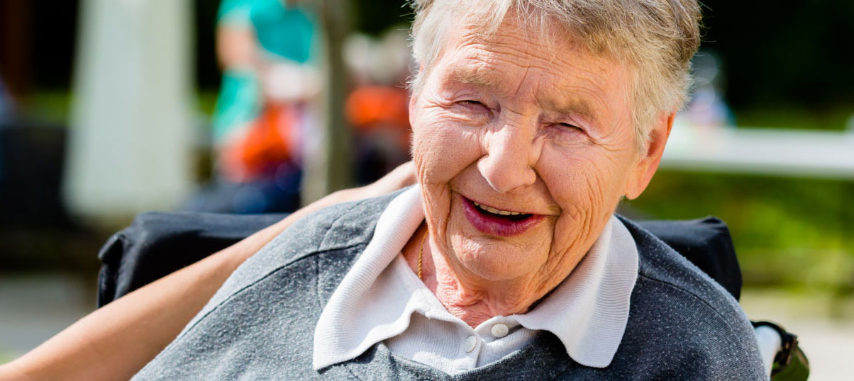 Close up of a smiling senior woman.