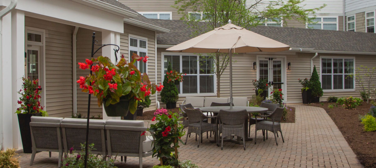 A view of a patio with chairs