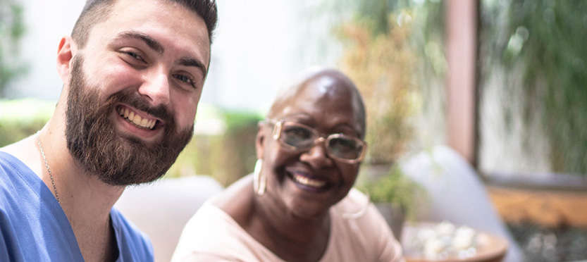 woman & nurse smiling