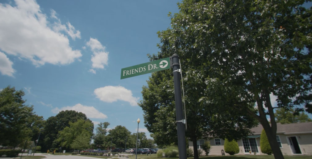 street sign with trees