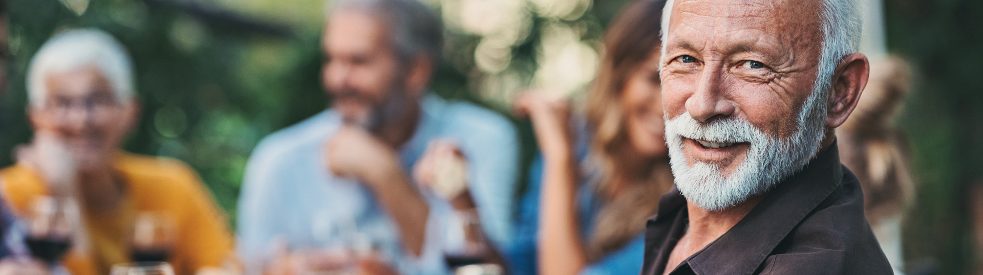 people drinking wine at table