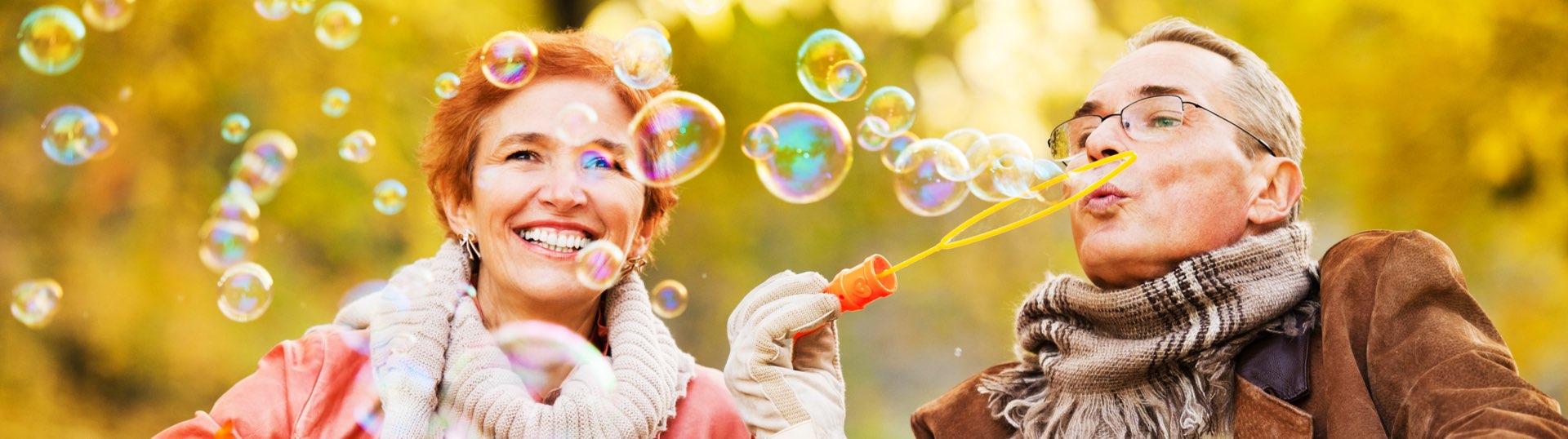 couple blowing bubbles