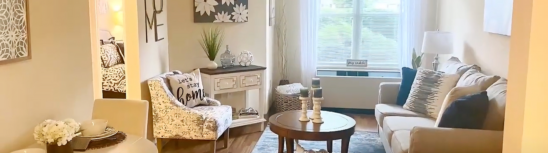 livingroom with 3 candles on table