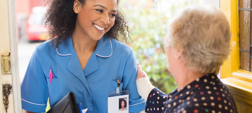 nurse smiling at woman