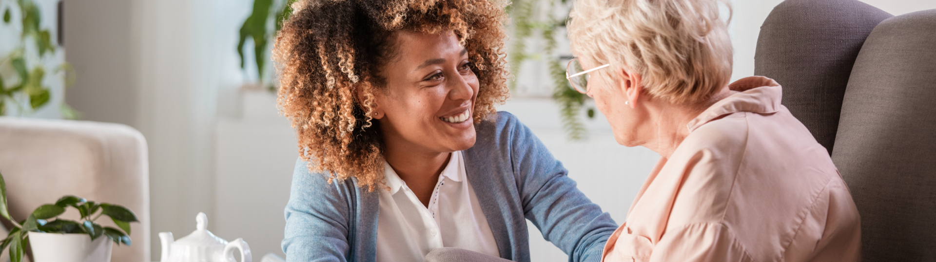 nurse talking to elderly patient