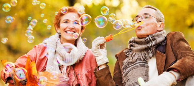 couple blowing bubbles