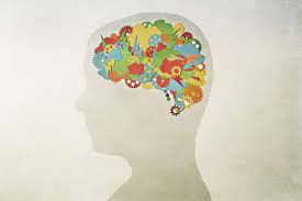 Clipart image of brain full of colorful gears.
