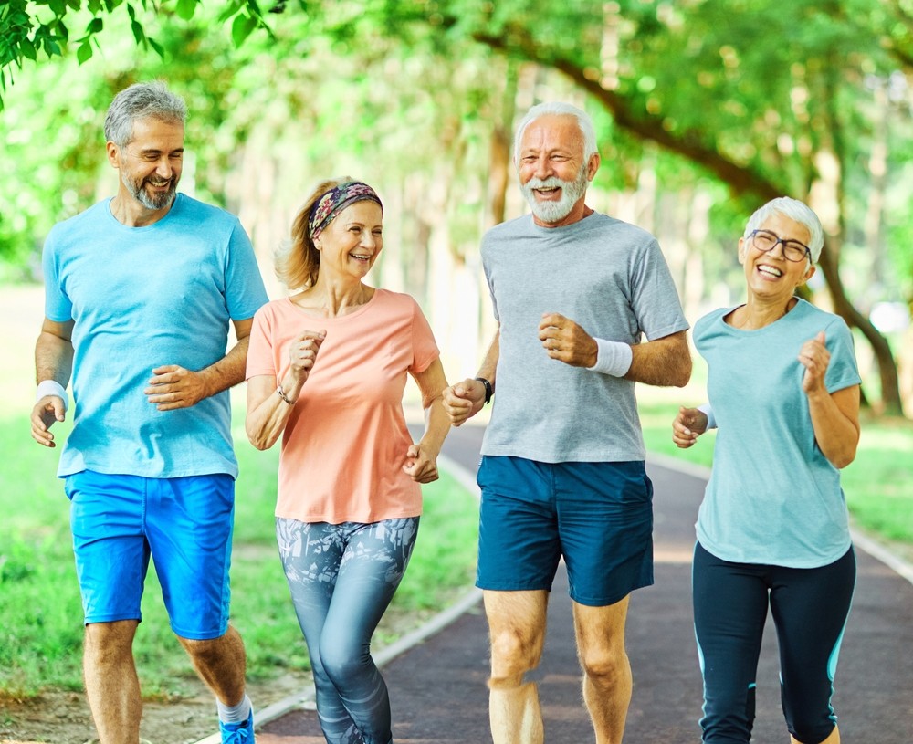 A group of seniors jog together.