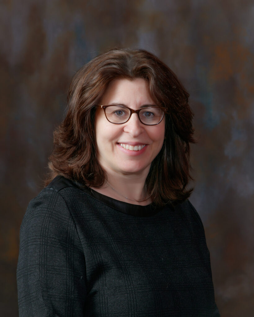 Headshot of Marcy Burach, senior director of sales and marketing