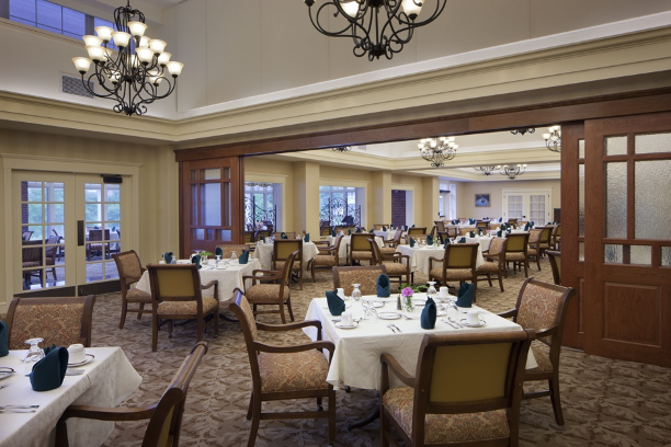 A photo of a formal dining room at the Fellowship Village retirement community