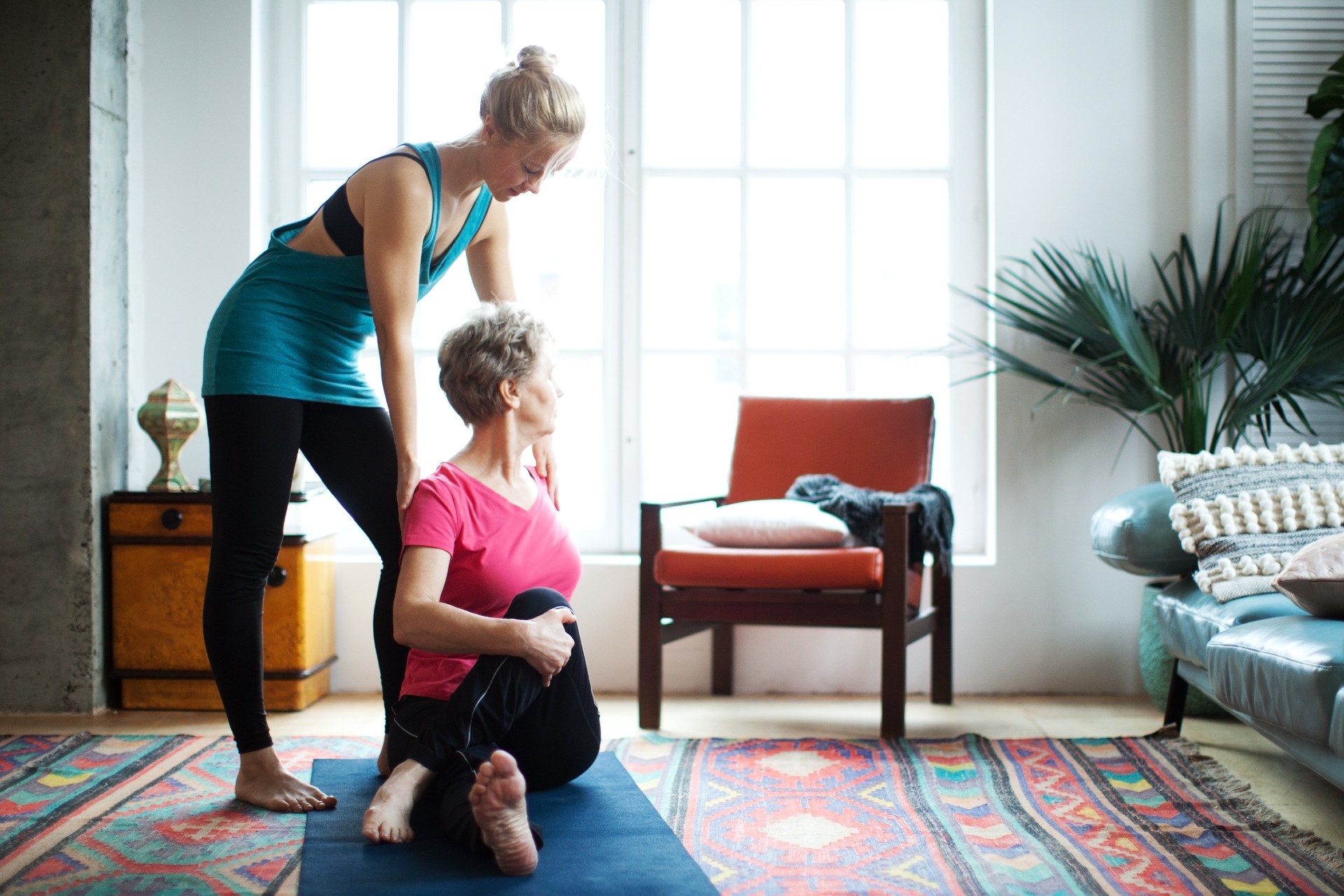 personal trainer at senior woman's home