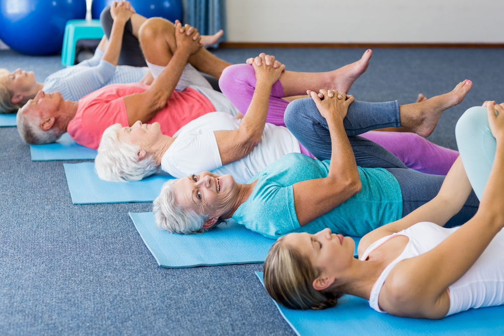 seniors in a yoga class